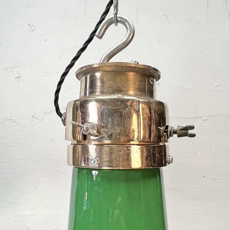 A green enamel rustic ceiling light with bronze top section and metal cage made in England by Thorlux circa 1940.