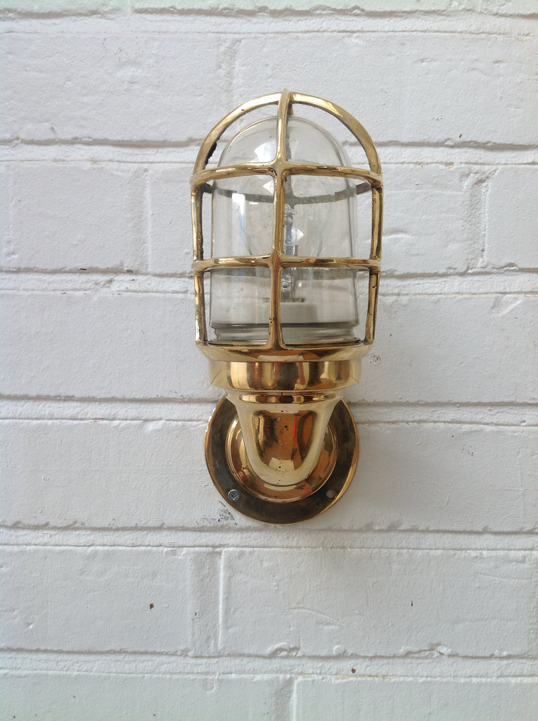 Reclaimed retro industrial style brass cage lighting for the wall